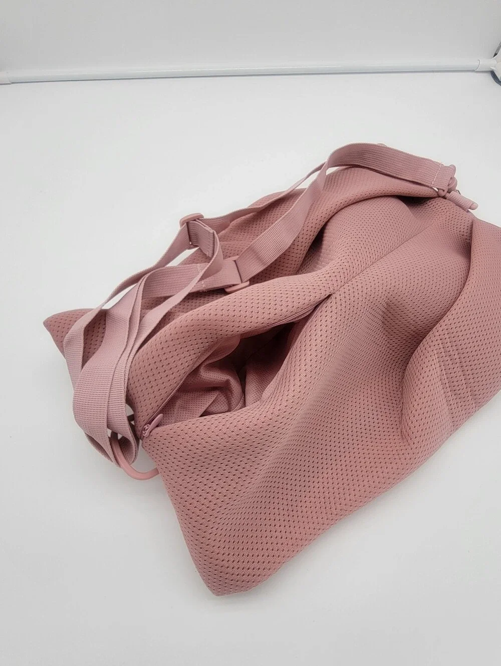 Fabletics Dusty Rose Perforated Neoprene Wristlet